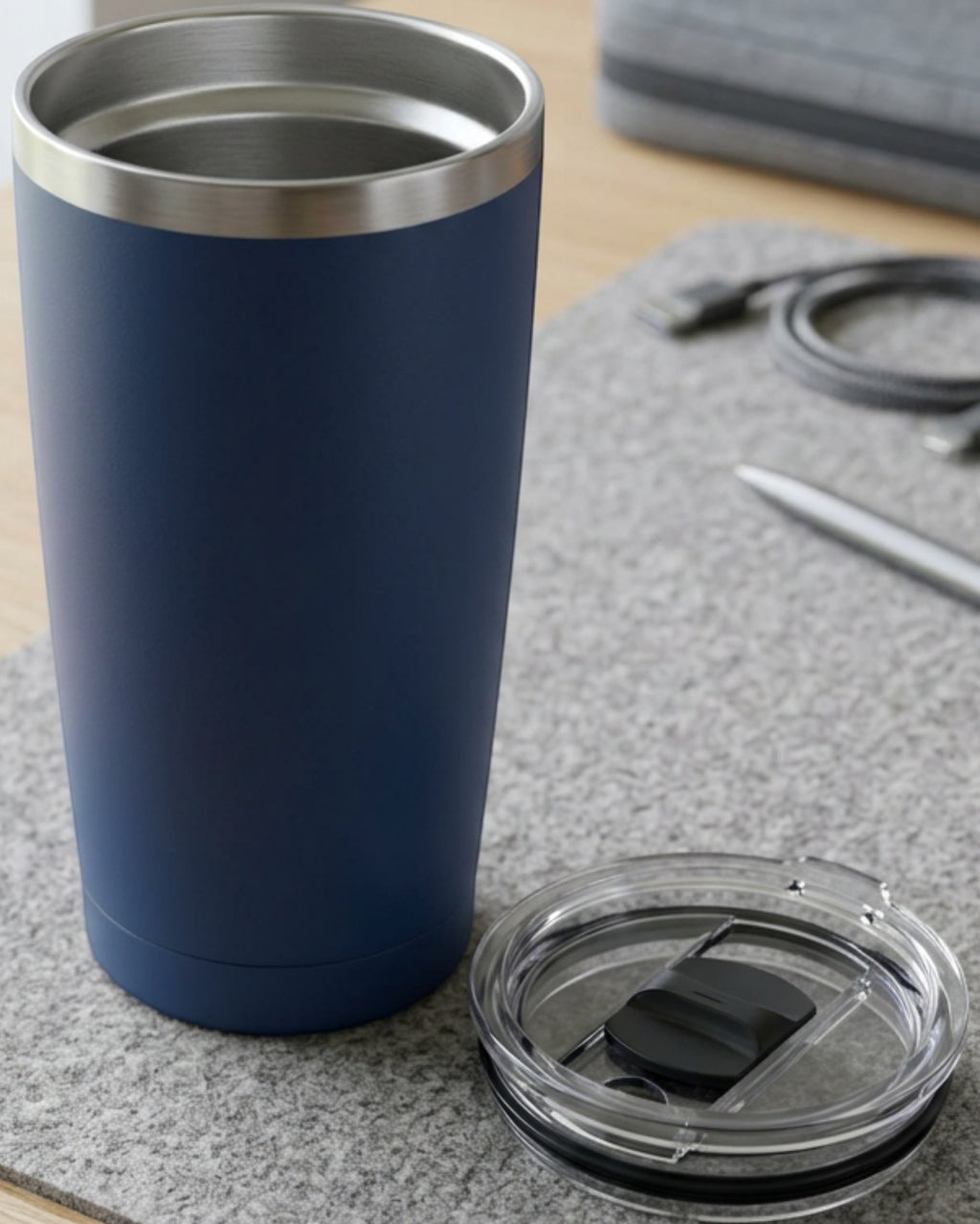 Rcvjn Seventeen Ounce Tapered Vacuum Tumbler with Linear Slider Lid Navy - Lifestyle view