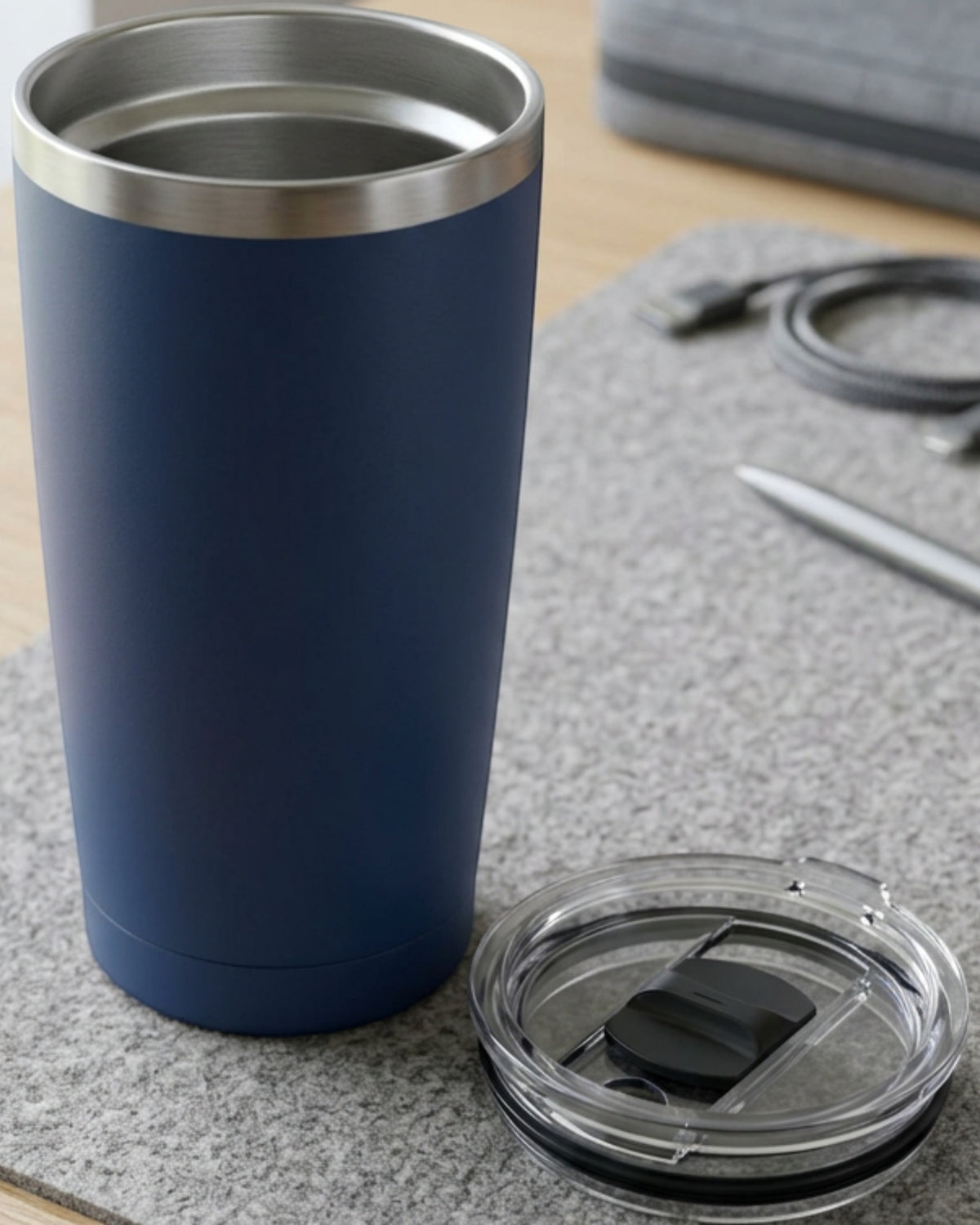 Rcvjn Seventeen Ounce Tapered Vacuum Tumbler with Linear Slider Lid Navy - Lifestyle view