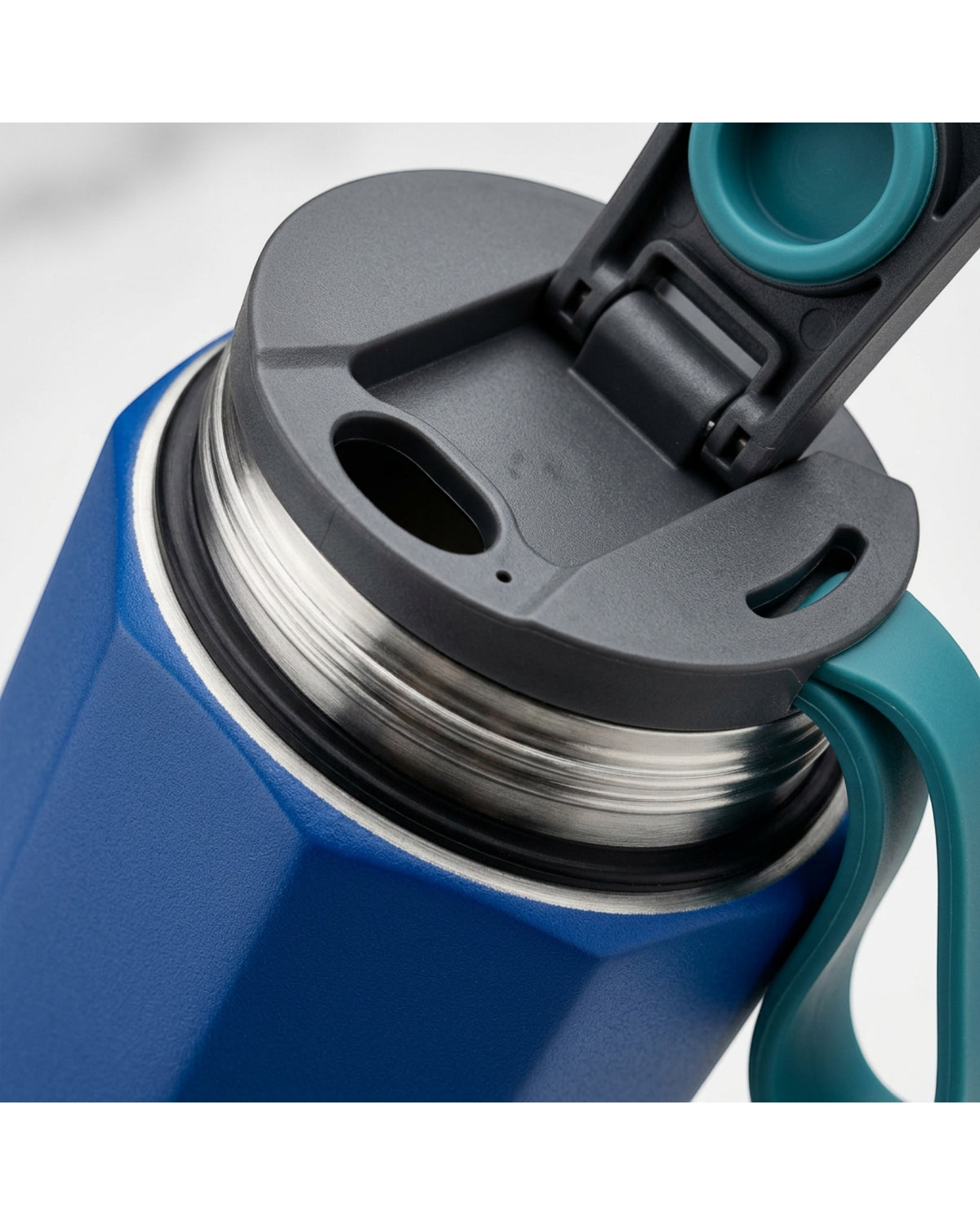 Rcvjn Twenty One Ounce Octagonal Vacuum Tumbler with Flip Spout and Loop Cobalt - Detail view